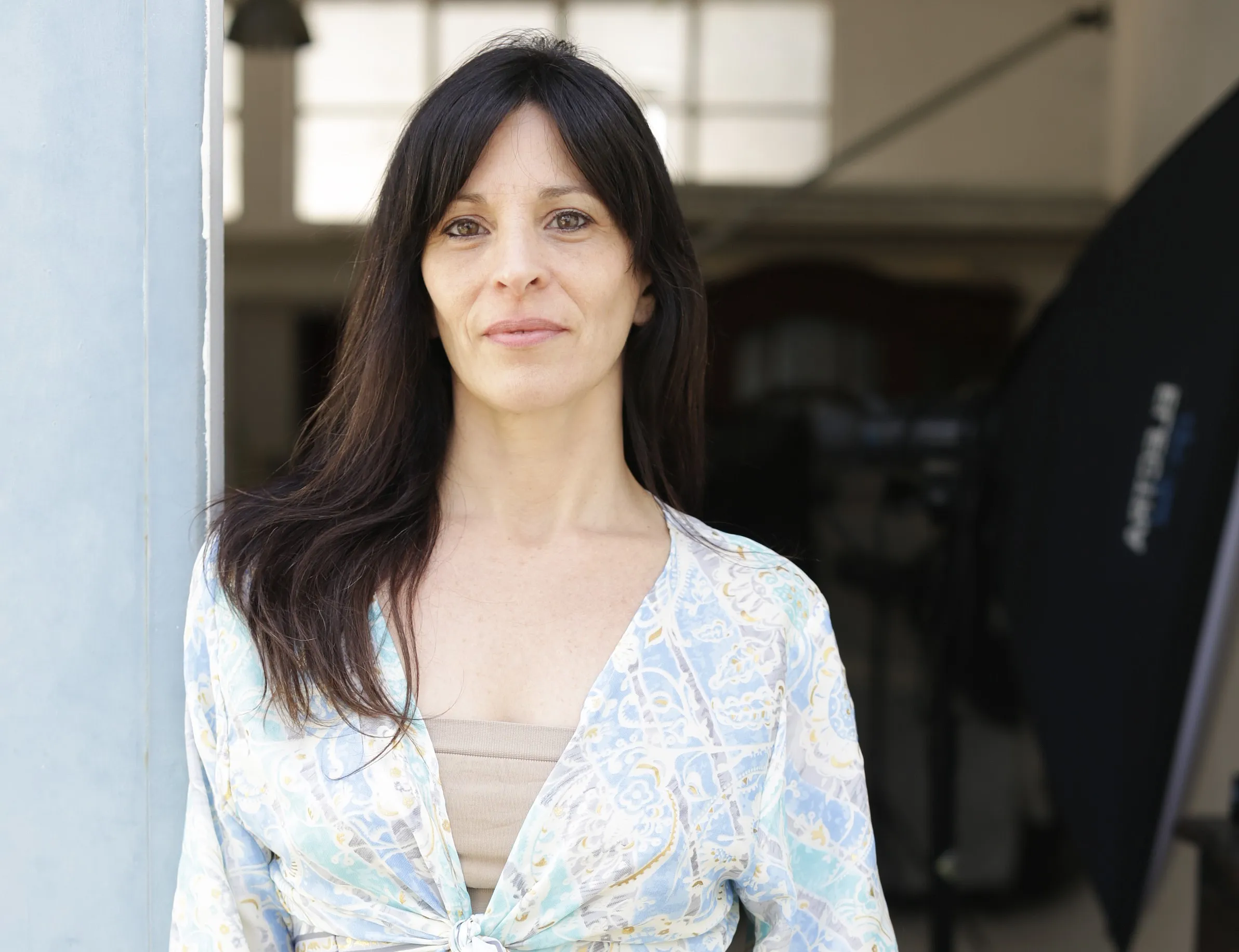 Retrato de Jessica Carmona sonriendo profesionalmente